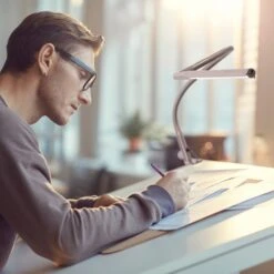 Daylight Company Techne Lamp D35000 -Painting Supplies 35000 Techne AG 01 Architect working on a design scaled 1